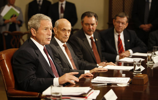 With Secretary Michael Chertoff of the Department of Homeland Security beside him, President George W. Bush speaks to the media in the Roosevelt Room Monday, Sept. 15, 2008, during an update on Hurricane Ike response and relief efforts. White House photo by Eric Draper