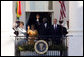President George W. Bush and Mrs. Laura Bush, joined by President John Agyekum Kufuor and Mrs. Theresa Kufuor of Ghana, acknowledge the crowd Monday, Sept. 15, 2008, following the South Lawn Arrival Ceremony for President Kufuor and Mrs. Kufuor of Ghana at the White House. White House photo by Chris Greenberg