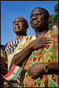 Guests in traditional Ghanaian dress stand for the playing of the national anthems Monday, Sept. 15, 2008, during the South Lawn Arrival Ceremony for President John Agyekum Kufuor of Ghana at the White House. White House photo by David Bohrer