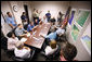 President George W. Bush speaks with state and local officials during a briefing Tuesday, Sept. 16, 2008, at the Galveston emergency operations center. The President spent the day in Texas visiting the areas hardest hit by Hurricane Ike, which made landfall September 13 near Galveston as a Category 2 storm with sustained winds of 110 miles per hour. White House photo by Eric Draper