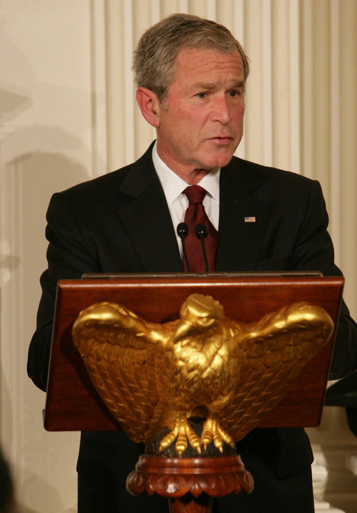 President George W. Bush welcomes guests to the Iftaar Dinner with Ambassadors and Muslim leaders in the State Dining Room of the White House, Thursday, Sept. 17, 2008, to celebrate the traditions of Islamic faith and culture. White House photo by Chris Greenberg