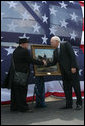 Re-enactment participant Jack Fishman presents Vice President Dick Cheney with an oil painting on September 19, 2008, depicting Cheney's great-grandfather Samuel Fletcher Cheney at the Battle of Chickamauga. Cheney's great-grandfather fought in the 1863 Civil War battle as a Captain in the 21st Ohio Volunteer Infantry. White House photo by David Bohrer