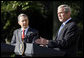 President George W. Bush gestures as he delivers his remarks during a joint press availability with Colombian President Alvaro Uribe Saturday, Sept. 20, 2008, in the Rose Garden at the White House. White House photo by Eric Draper