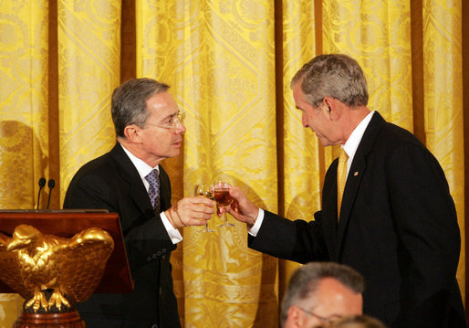 President George W. Bush shares a toast with Colombian President Alvaro Uribe Saturday, Sept. 20, 2008, during a social dinner with the President of Colombia at the White House. White House photo by Joyce N. Boghosian