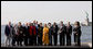President George W. Bush and Mrs. Laura Bush participate in a photo opportunity with political dissidents Tuesday, Sept. 23, 2008, on Governors Island in New York. President Bush stated in his remarks, "Here in America, we have an obligation to help others realize the blessings of liberty. And so we want to thank you very much for your courage. We thank you for your set of beliefs that remain strong." White House photo by Eric Draper