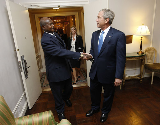 President George W. Bush greets Uganda's President Yoweri Museveni Tuesday, Sept. 23, 2008, at The Waldorf-Astoria Hotel in New York. President Bush thanked his counterpart for implementing the Malaria Initiative and said, "There's been over 200,000 bed nets distributed in your country, Mr. President, and that's because of the leadership of you and the organization of your government." White House photo by Eric Draper