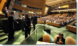 President George W. Bush acknowledges the audience after delivering remarks Tuesday, Sept. 23, 2008, to the United Nations General Assembly in New York. In his last address as President of the United States, President Bush said, "The United Nations is an organization of extraordinary potential. As the United Nations rebuilds its headquarters, it must also open the door to a new age of transparency, accountability, and seriousness of purpose. With determination and clear purpose, the United Nations can be a powerful force for good as we head into the 21st Century."  White House photo by Eric Draper