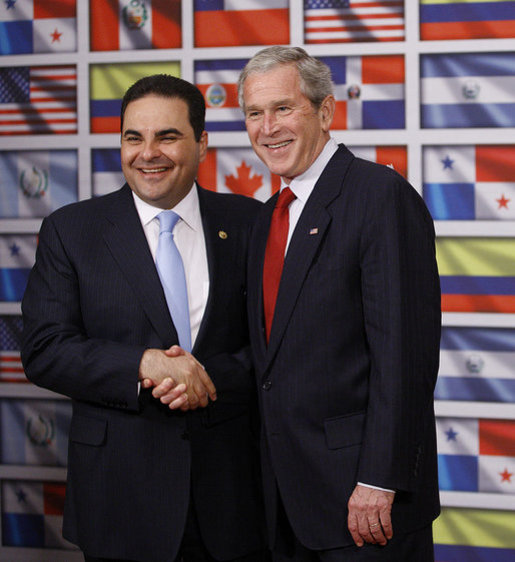 President George W. Bush shakes hands with President Antonio Saca of El Salvador after delivering a statement on temporary protected status during a visit by President Bush Wednesday, Sept. 24, 2008, to the Council of the Americas. Said President Bush, "I want to let my friend know, and the people of El Salvador, that the United States will extend TPS status to El Salvadoreans living in our country. I'm proud to make this announcement with you standing by my side." White House photo by Eric Draper