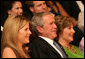 President George W. Bush, Mrs.Laura Bush and their daughter, Jenna Hager are seen together at the Library of Congress Friday evening, Sept. 26, 2008 in Washington, D.C., during the 2008 National Book Festival Gala Performance, an annual event celebrating books and literature. White House photo by Joyce N. Boghosian