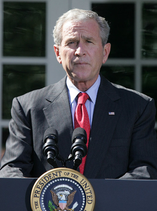 President George W. Bush pauses as he delivers a statement on the Emergency Economic Stabilization Act of 2008 Friday, Oct. 3, 2008, in the Rose Garden of the White House. Said the President, "There were moments this week when some thought the federal government could not rise to the challenge. But thanks to the hard work of members of both parties in both Houses -- and a spirit of cooperation between Capitol Hill and my administration -- we completed this bill in a timely manner." White House photo by Joyce N. Boghosian