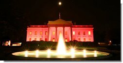Floodlights turned the north side of the the White House pink on the evening of Oct. 7, 2008 to raise awareness about breast cancer. The unique view of the North Portico facing Lafayette Park was to observe Breast Cancer Awareness Month. Breast cancer awareness is a cause for which Mrs. Laura Bush has worked to motivate both public and private sectors, worldwide, as as she has encouraged collaborative research to find a cure. The World Health Organization says each year more than 1.2 million people worldwide are diagnosed with it and breast cancer is one of the leading causes of death for women. White House photo by Grant Miller