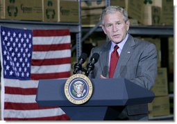 President George W. Bush addresses his remarks on the nation's economy to state and local business leaders Tuesday, Oct. 7, 2008, during his visit to the Guernsey Office Products, Inc. in Chantilly, Va. President Bush said the Emergency Economic Stabilization Act of 2008 will take time to have its full effect in improving the economy.  White House photo by Chris Greenberg