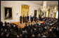 President George W. Bush addresses his remarks prior to signing H.R. 7081, The United States-India Nuclear Cooperation Approval and Nonproliferation Enhancement Act, Wednesday, Oct. 8, 2008, in the East Room at the White House. President Bush is joined on stage by, from left, Rep. Joseph Crowley, D-N.Y., Rep. Eliot Engel, D-N.Y., Secretary of State Condoleezza Rice, Sen. Chris Dodd D-Conn., Senator John Warner of Virginia, Energy Secretary Samuel Bodman, India's Ambassador to the United States Ronen Sen and Vice President Dick Cheney. White House photo by Chris Greenberg
