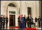 President George W. Bush and Mrs. Laura Bush welcome Italian Prime Minister Silvio Berlusconi Monday evening, Oct. 13, 2008, to the North Portico of the White House for a State Dinner in his honor. White House photo by Joyce N. Boghosian