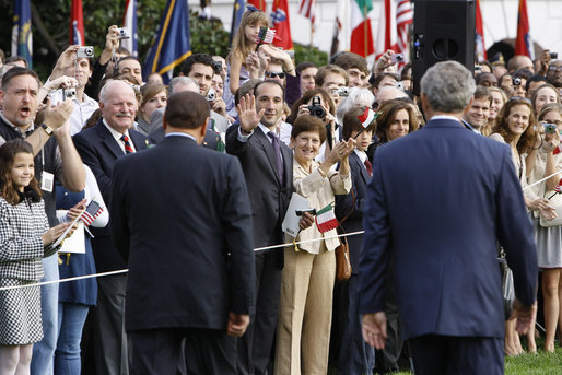 Crowds on the South Lawn of the White House cheer President George W. Bush and Italian Prime Minister Silvio Berlusconi Monday, Oct. 13, 2008, during the official welcoming ceremony for the prime minister. White House photo by Eric Draper