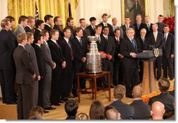 President George W. Bush welcomes the Detroit Red Wings NHL Hockey team, winners of the 2008 Stanley Cup, Tuesday, Oct. 14, 2008, to the East Room at the White House. White House photo by Chris Greenberg