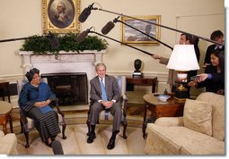 President George W. Bush and Liberia President Ellen Johnson Sirleaf talk with reporters following their meeting Wednesday, Oct. 22, 2008, in the Oval Office at the White House. President Bush said during his remarks, "Liberia needs the help of the United States and other nations to help make sure children are educated, to make sure babies are not dying because of malaria, to make sure there's an infrastructure so that small businesses can flourish, to make sure port is open for business. We have been helpful and we want to be helpful in the future." White House photo by Eric Draper