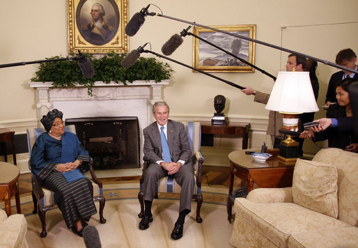 President George W. Bush and Liberia President Ellen Johnson Sirleaf talk with reporters following their meeting Wednesday, Oct. 22, 2008, in the Oval Office at the White House. President Bush said during his remarks, "Liberia needs the help of the United States and other nations to help make sure children are educated, to make sure babies are not dying because of malaria, to make sure there's an infrastructure so that small businesses can flourish, to make sure port is open for business. We have been helpful and we want to be helpful in the future." White House photo by Eric Draper