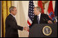 President George W. Bush shakes hands with NATO Secretary General Jaap De Hoop Scheffer Friday, Oct. 24, 2008 in the East Room of the White House, following an address honoring President Bush's support of the NATO accession protocols in support of the nations of Albania and Croatia to join the NATO alliance. White House photo by Eric Draper