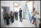 Mrs. Laura Bush is joined by homeowner Joretta Roman as she views the renovation project at Roman's home Thursday, October 30, 2008, in New Orleans, La., during a tour of the home being rennovated by Catholic Charities Operation Helping Hands. The home sustained damage during Hurricane Katrina. White House photo by Chris Greenberg