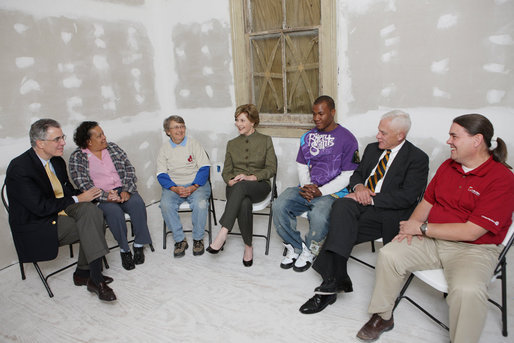 Mrs. Laura Bush visits with Mr. Jim Kelly, CEO and co-president of Catholic Charities Archdiocese of New Orleans, left; homeowner Mrs. Joeretta Roman, Ms. Nancy Parlin, Consociate Candidate, Sisters of St. Joseph of the Province of St. Paul, third from left; Mr. Ashton Johnson, student YouthBuild Helping Hands; Mr. Doug O'Dell, Federal Coordinator, Office of the Federal Coordinator for Gulf Coast Rebuilding, 2nd right, and Mr. Kevin Fitzpatrick, Volunteer Housing Coordinator, Operation Helping Hands, right, Thursday, October 30, 2008, in New Orleans, La., during a tour of the home of Joretta Roman which is being rennovated by Catholic Charities Operation Helping Hands after sustaining damage from Hurricane Katrina. White House photo by Chris Greenberg