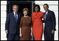 President George W. Bush and Mrs. Laura Bush and President-elect Barack Obama and Mrs. Michelle Obama pause for photographs Monday, Nov. 10, 2008, after the Obama's arrival at the South Portico of the White House. White House photo by Chris Greenberg