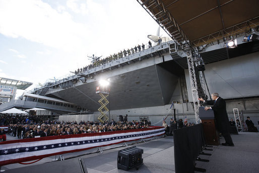 President George W. Bush gestures as he addresses his remarks in honor of Veteran's Day Tuesday, Nov. 11, 2008, at the rededication ceremony of the Intrepid Sea, Air and Space Museum in New York. White House photo by Eric Draper