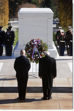 Vice President Dick Cheney stands in silence after placing a wreath at the Tomb of the Unknowns Tuesday, Nov. 11, 2008 during the 55th Annual National Veterans Day Observance at Arlington National Cemetery in Arlington, Va. Standing with the Vice President is Major General Richard J. Rowe Jr., commander of the Military District of Washington.  White House photo by David Bohrer