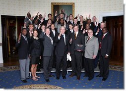 President George W. Bush poses with members of the Florida State University Men's Outdoor Track and Field Team Wednesday, Nov. 12, 2008, during a photo opportunity with 2008 NCAA Sports Champions at the White House. White House photo by Chris Greenberg