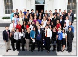 President George W. Bush poses with members of the University of Arizona Men's and Women's Swimming and Diving Team Wednesday, Nov. 12, 2008, during a photo opportunity with 2008 NCAA Sports Champions at the White House.  White House photo by Chris Greenberg