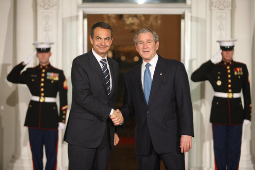 President George W. Bush greets Spain's President Jose Luis Rodriquez Zapatero Friday, Nov. 14, 2008, upon his arrival for dinner with Summit on Financial Markets and World Economy Leaders at the White House. White House photo by Chris Greenberg