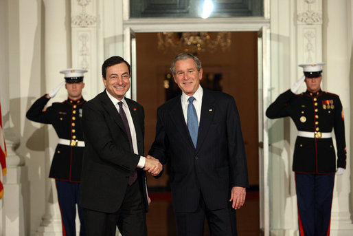 President George W. Bush greets Bank of Italy Governor and Financial Stability Forum Chairman Mario Draghi Friday, Nov. 14, 2008, upon his arrival for dinner with Summit on Financial Markets and the World Economy Leaders at the White House. White House photo by Chris Greenberg