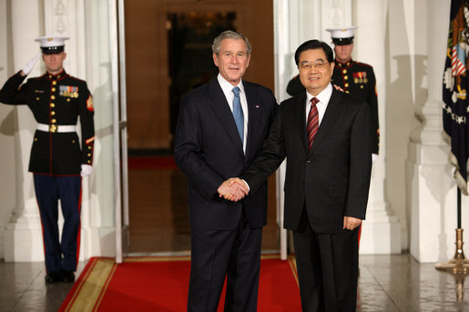 President George W. Bush welcomes President Hu Jintao of the People's Republic of China to the White House Friday, Nov. 14, 2008, for a dinner with Summit on Financial Markets and World Economy Leaders. White House photo by Chris Greenberg