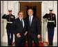 President George W. Bush stands with President Luiz Inacio Lula da Silva of Brazil upon the South American leader's arrival to the White House Friday, Nov. 14, 2008, for a dinner to open the Summit on Financial Markets and World Economy. White House photo by Chris Greenberg