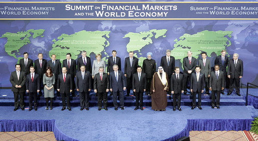 President George W. Bush stands with fellow world leaders Saturday, Nov. 15, 2008, for the family photo at the Summit on Financial Markets and the World Economy at the National Building Museum in Washington, D.C. White House photo by Grant Miller