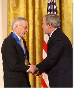 President George W. Bush congratulates legendary comic book creator Stan Lee of Los Angeles, as a recipient of the 2008 National Medal of Arts in ceremonies Monday, Nov. 17, 2008 at the White House. White House photo by Chris Greenberg