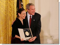 President George W. Bush congratulates Carla Maxwell, artistic director of the Jose Limon Dance Foundation of New York, as a recipient of the 2008 National Medal of Arts in ceremonies Monday, Nov. 17, 2008 at the White House. White House photo by Joyce N. Boghosian
