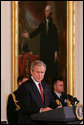 President George W. Bush welcomes the award recipients to the presentation of the 2008 National Medal of Arts and 2008 National Humanities Medal, honoring those for their outstanding contributions to the arts, and the preservation and education of the humanities in America. White House photo by Joyce N. Boghosian