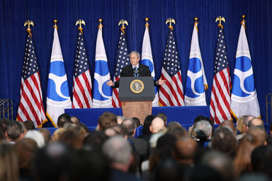 President George W. Bush gestures as he addresses his remarks at the U.S. Transportation Department in Washington, D.C., Tuesday, Nov. 18, 2008, where President Bush announced an expansion of the U.S. airspace for civilian flights, the "Thanksgiving Express Lanes," to now include areas of the Midwest, Southwest and the West Coast to reduce holiday airline delays and to also boost flight capacity at some of America's busiest airports. White House photo by Chris Greenberg