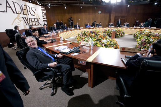 President George W. Bush relaxes in his chair during the afternoon leaders retreat Saturday, Nov. 22, 2008, at the APEC Summit in Lima, Peru. White House photo by Eric Draper