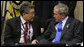 President George W. Bush talks with Spencer Kim, Chairman of CBOL Corporation and U.S. representative to the APEC Business Advisory Council, during a dialogue with ABAC leaders Saturday, Nov. 22, 2008, in Lima, Peru. White House photo by Eric Draper
