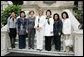 Mrs. Laura Bush stands for photographs on the steps of the Government Palace Residence Saturday, Nov. 22, 2008, with spouses of APEC leaders following a breakfast hosted by Mrs. Pilar Nores de Garcia, First Lady of Peru, in Lima. With her, from left are: Madam Ho, Spouse of Prime Minister Lee Hsien Loong of Singapore; Mrs. Kristiani Herawati, spouse of Indonesia's President Susilo Bambang Yudhoyono; Mrs. Bush; Mrs. Pilar Nores Bodereau de Garcia, spouse of Peru's President Alan Garcia; Mrs. Kim Yoon-ok, spouse of President Lee Myung-bak; Mrs. Rosmah Mansor, spouse of Malaysian Deputy Prime Minister Najib Razak, and Mrs. Chikako Aso, wife of Prime Minister Taro Aso of Japan. White House photo by Joyce N. Boghosian