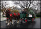Sue Harman drives a horse-drawn carriage delivering the official White House Christmas tree Sunday, Nov. 30, 2008, to the North Portico of the White House. The Fraser Fir tree, from River Ridge Farms in Crumpler, N.C., will be on display in the Blue Room of the White House for the 2008 Christmas season. White House photo by Joyce N. Boghosian