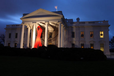 A red ribbon adorns the North Portico of the White House at dawn Monday, Dec. 1, 2008, in recognition of World AIDS Day and the commitment by President George W. Bush and his administration to fighting and preventing HIV/AIDS in America and the world. White House photo by Chris Greenberg