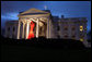 A red ribbon adorns the North Portico of the White House at dawn Monday, Dec. 1, 2008, in recognition of World AIDS Day and the commitment by President George W. Bush and his administration to fighting and preventing HIV/AIDS in America and the world. White House photo by Chris Greenberg