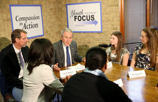 President George W. Bush participates in a roundtable on mentoring children of prisoners initiative Tuesday, Dec. 2, 2008, at the Youth Focus, Inc., in Greensboro, N.C., where President Bush praised the Youth Focus program for their work in helping youngsters toward a brighter future. White House photo by Chris Greenberg