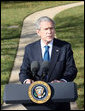 President George W. Bush delivers his remarks on the economy from the south driveway Friday, Dec. 5, 2008, at the White House. President Bush stated during his remarks, "We're working with the Federal Reserve and FDIC, and credit is beginning to move. A market that was frozen is thawing. There's still more work to do. But there are some encouraging signs."  White House photo by Chris Greenberg