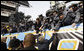 President George W. Bush reaches up to the Cadets of West Point Saturday, Dec. 6, 2008, at Lincoln Financial Field where he joined the global millions in watching the 2008 Army-Navy game. The rivalry, pitting West Point and the Naval Academy, has been a tradition since 1908. The 28-0 win by the Midshipman gave them 53 wins to Army's 49. White House photo by Eric Draper