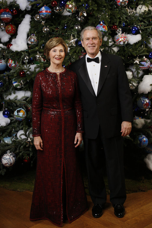 President George W. Bush and Mrs. Laura Bush pose for their 2008 holiday portrait Sunday, Dec. 7, 2008, in the Blue Room of the White House. White House photo by Eric Draper