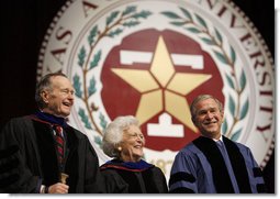 President George W. Bush smiles with his parents, former President George H.W. Bush, left, and former first lady Barbara Bush following his commencement address at Texas A&M University's winter convocation Friday, Dec. 12, 2008, in College Station, Texas. White House photo by Eric Draper